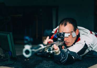 Man on sport shooting training practicing for competition